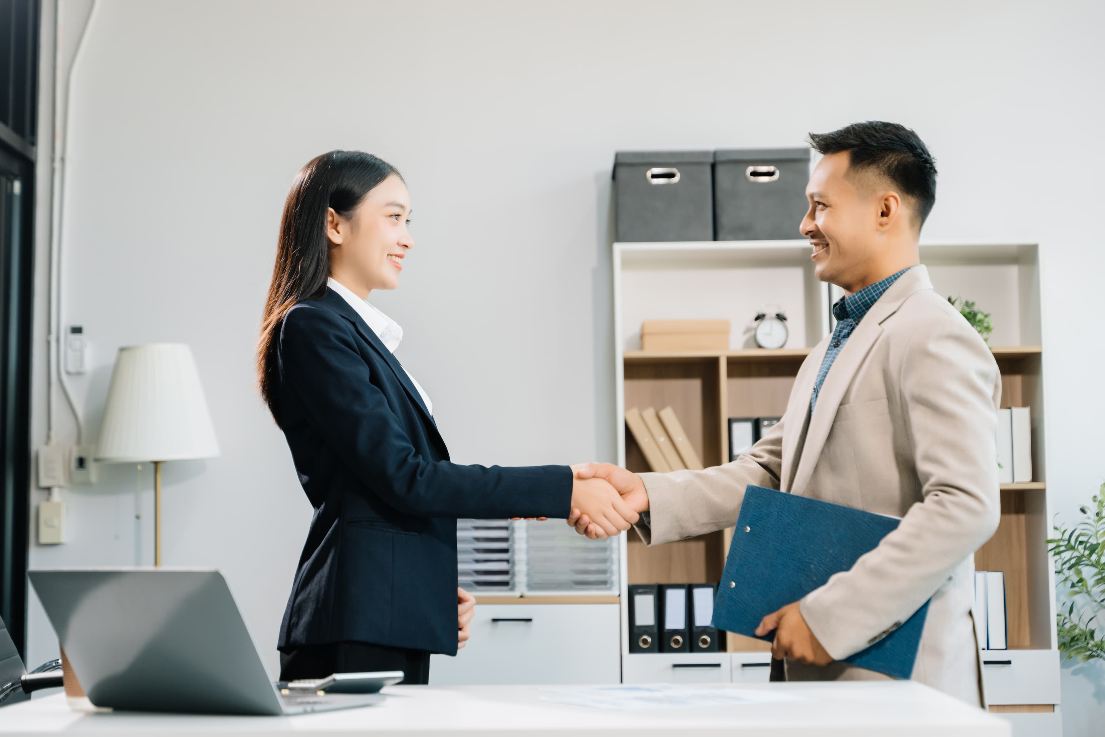 two-confident-business-man-shaking-hands-during-a-2024-12-13-00-48-48-utc